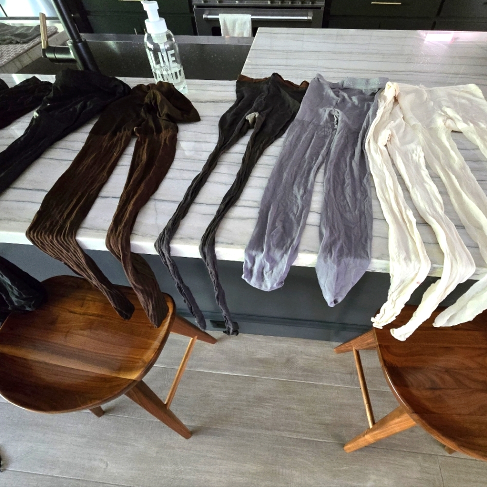 10 pairs in various shades of used panty hose, one sheer pate of seamed stocking